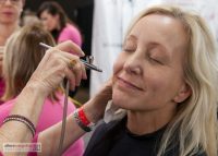 Dinair airbrush "air kisses" for the 64th Primetime Emmys