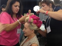 The pink Dinair Emmy updo is coming together!