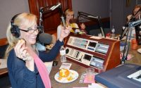 Susan Irby tasting Pumpkin Creme Brulee and Macaroons