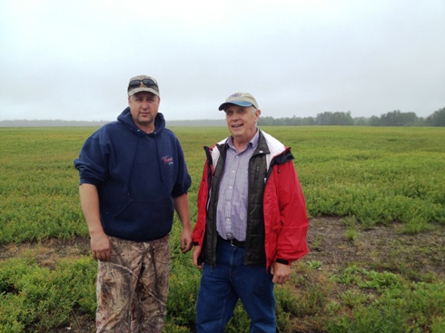 David Yarborough, right, with one of the lead growers