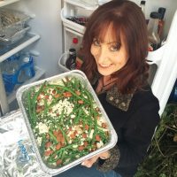 Susan holding Sauteed Green Beans