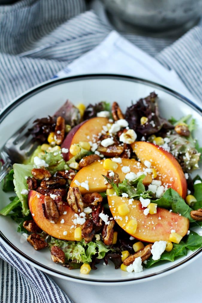 Mixed greens with peaches