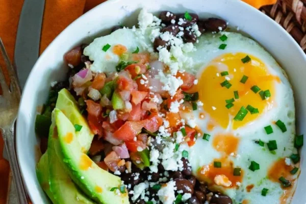 Eggs with black beans avocado and salsa