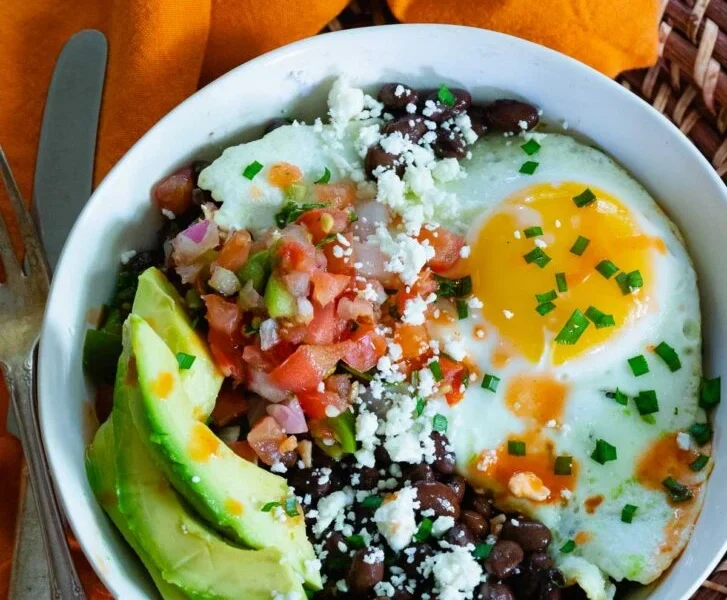 Eggs with black beans avocado and salsa