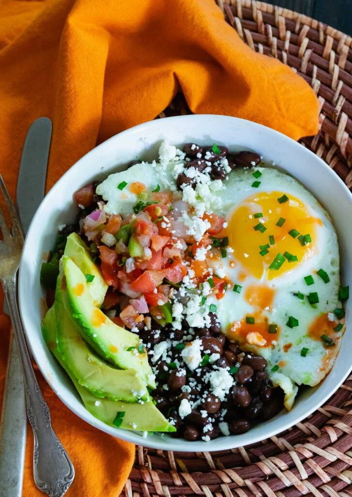Eggs with black beans avocado and salsa