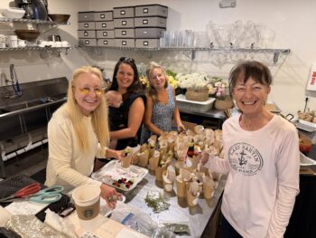 Family making Charcuterie Cups